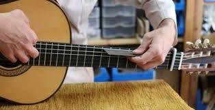 REPARACION Y PUESTA A PUNTO  GUITARRAS Y VIOLINES