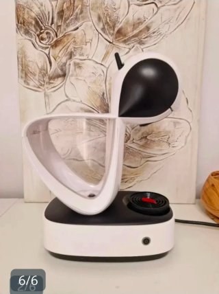 Cafetera Dolce Gusto Blanca y Negra