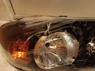 Faro Nissan Almera 2005