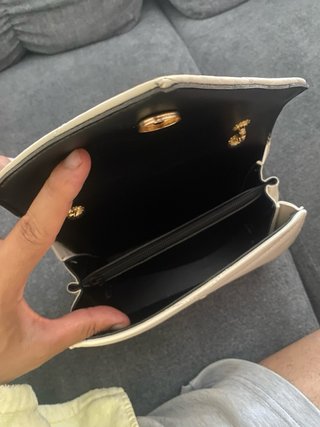 Bolso Saint Laurent biege y dorado