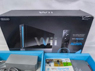 Nintendo Wii Negra + Juegos y accesorios.