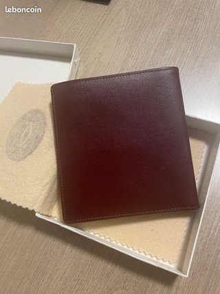 Cartera Must de Cartier para hombre