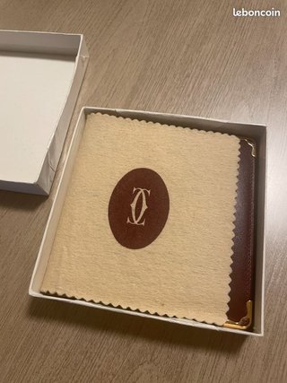 Cartera Must de Cartier para hombre