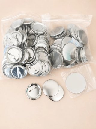 Materiales para chapas 58mm Bolsa de 100 chapas