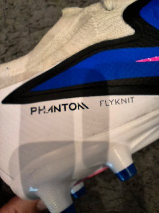 Botas de fútbol Nike Phanton AG azules y blancas