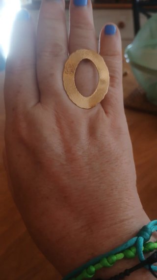Anillo grande dorado acero