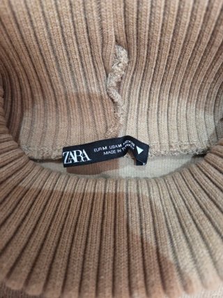Jersey cuello vuelto sin mangas