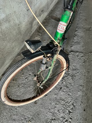 Bicicleta verde para restaurar