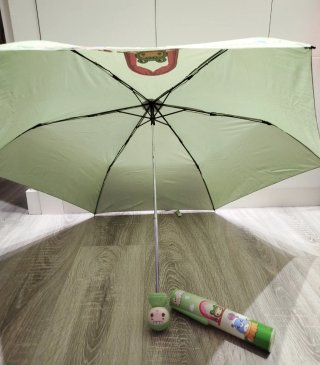 Paraguas infantil plegable forma muñeco