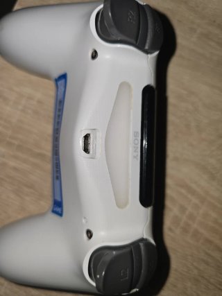 Mando PS4 Blanco boton no va de r2 del disparo