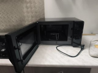 Microondas Nevir Negro Nuevo Sin Usar