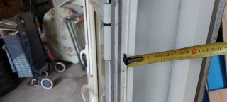 Ventana aluminio blanco con persiana.Puente térmic