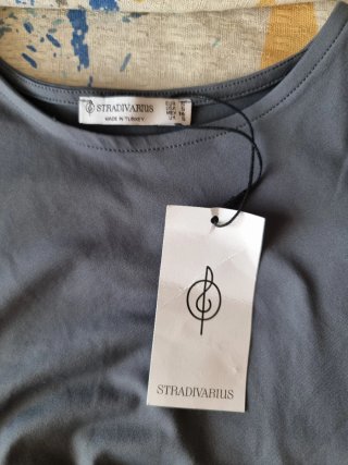 Vestito lungo grigio con drappeggio