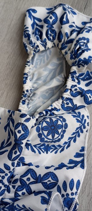 Mono estampado azul y blanco