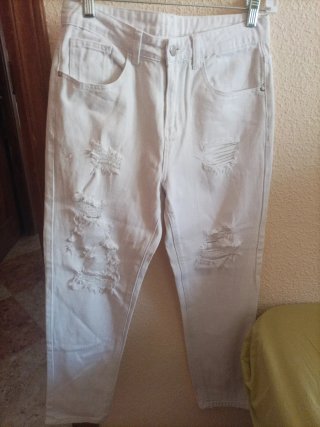Pantalones vaqueros blancos rotos
