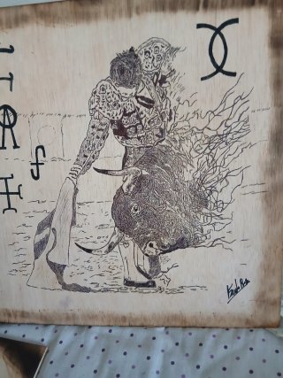 Pintura en tinta y madera