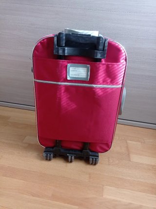 Maleta roja con ruedas extensible 5 cm de ancho