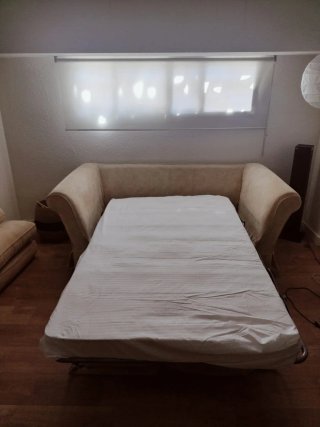 Sofá cama beige de tela
