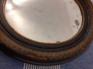 Specchio ovale vintage nero e oro