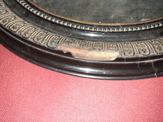 Specchio ovale vintage nero e oro
