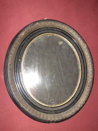 Specchio ovale vintage nero e oro