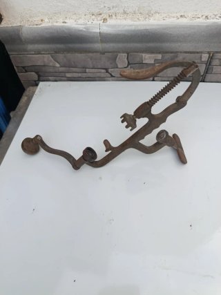 Antigua herramienta para cartuchos