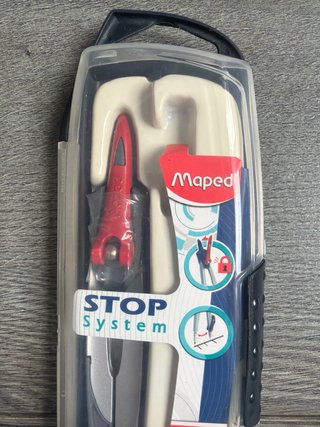 Compás Maped con sistema Stop