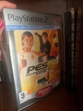 Consola PlayStation 2 + 2 Mandos+ 14 juegos