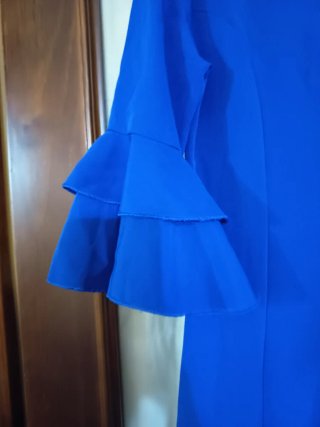 Traje de flamenca azul con volantes