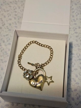 Pulsera Guess Corazón y Estrella Dorada