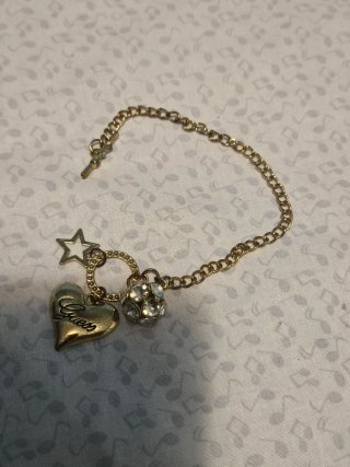 Pulsera Guess Corazón y Estrella Dorada
