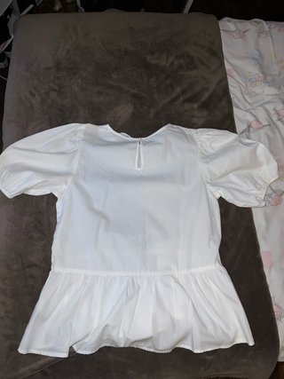 Camisa blanca manga abullonada