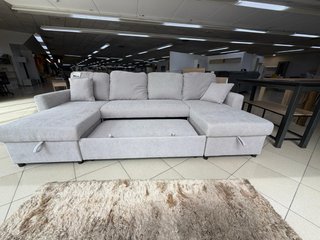 Sofá cama gris en forma de U con 2 Arcones