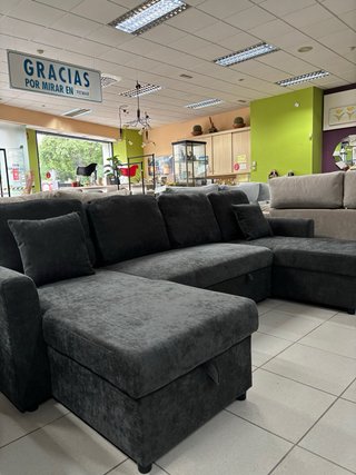 Sofá cama gris en forma de U con 2 Arcones