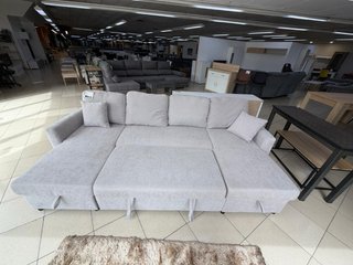 Sofá cama gris en forma de U con 2 Arcones