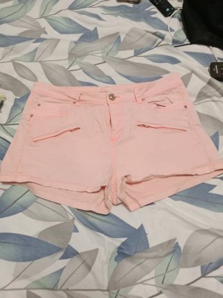 Shorts vaqueros amarillos desgastados