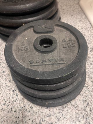 Barra y discos musculación