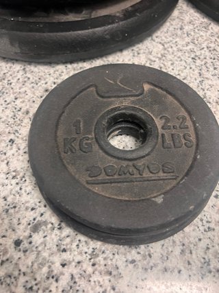 Barra y discos musculación