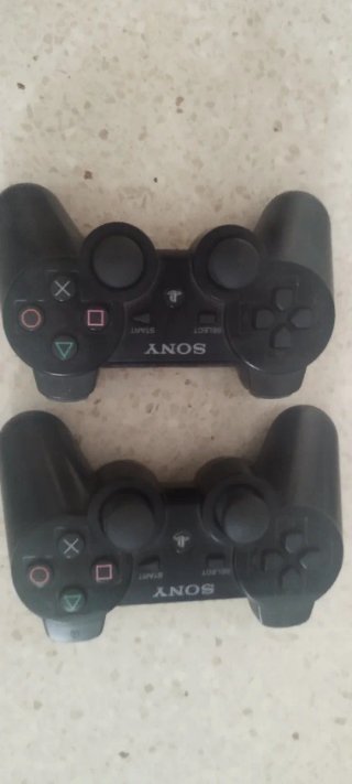 Consola PlayStation 3 Negra, accesorios y juegos