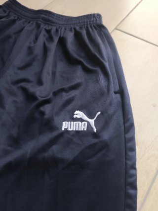 Pantalón chándal Puma OM azul y negro