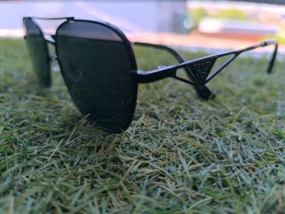 Gafas de sol Prada negras y grises