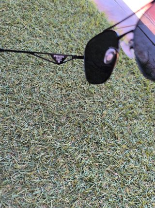 Gafas de sol Prada negras y grises