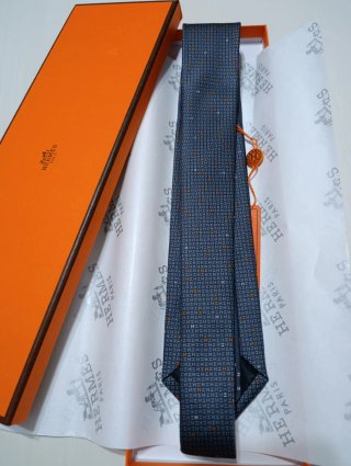 Corbata Hermès azul y naranja