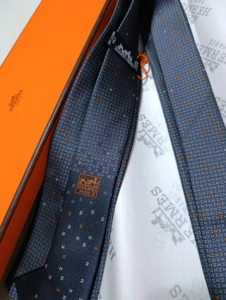 Corbata Hermès azul y naranja