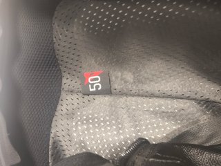 Mono Dainese Cuero Negro Verde