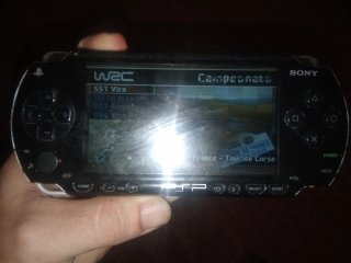 PSP con 2 juegos y película Resident Evil