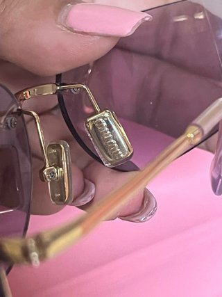 Gafas de sol Miu Miu moradas y doradas