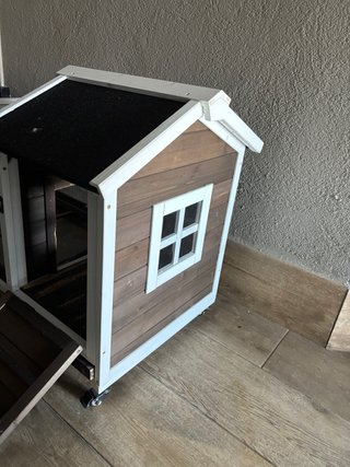 Jaula con casa para conejo