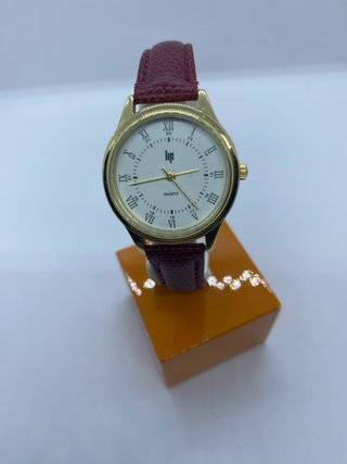 Reloj LIP Quartz Dorado y Blanco