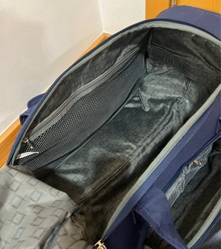 Maleta de cabina azul con ruedas